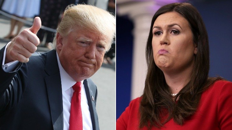 Donald Trump y Sarah Huckabee Sanders