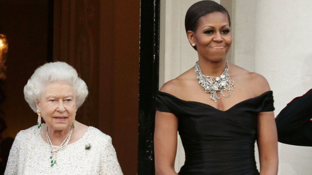 Barack Obama, la reina Isabel y Michelle Obama