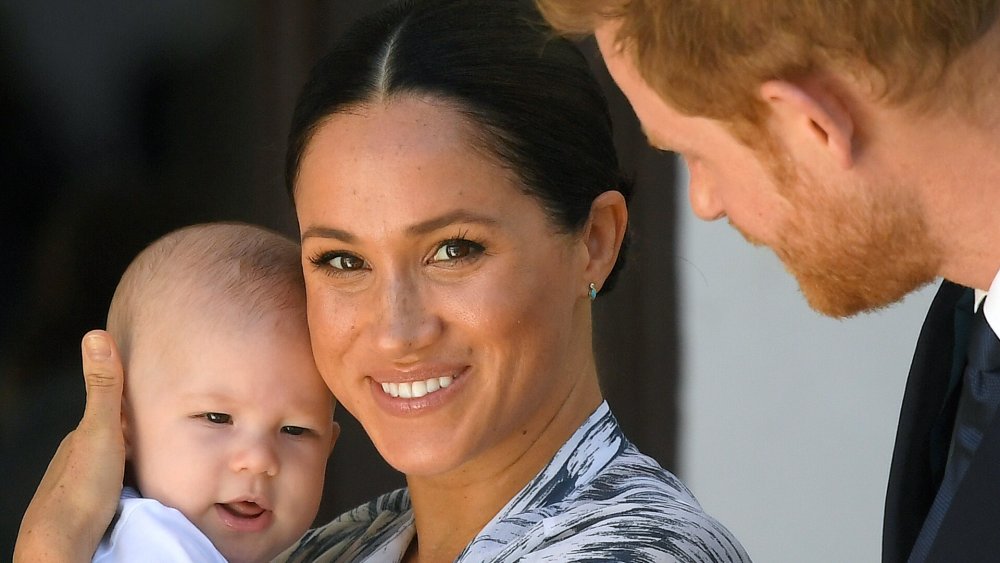 Meghan con el bebé Archie y el príncipe Harry 