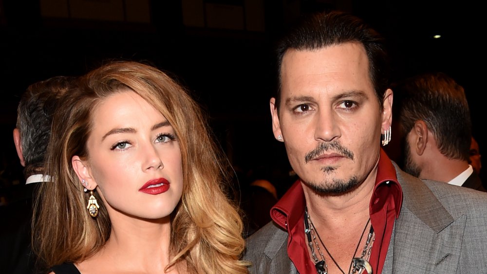 Amber Heard y Johnny Depp en el estreno de Black Mass en TIFF 