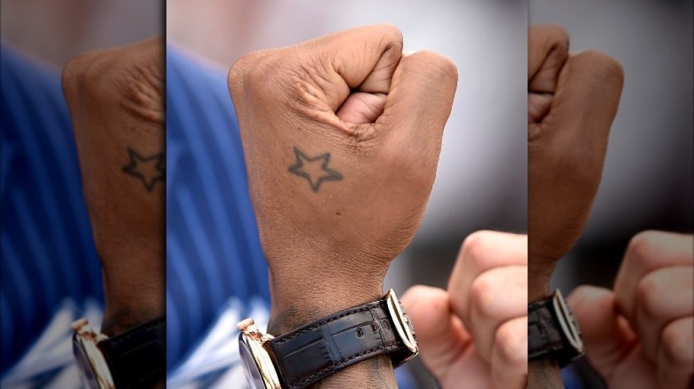 Tatuaje estrella de Usher