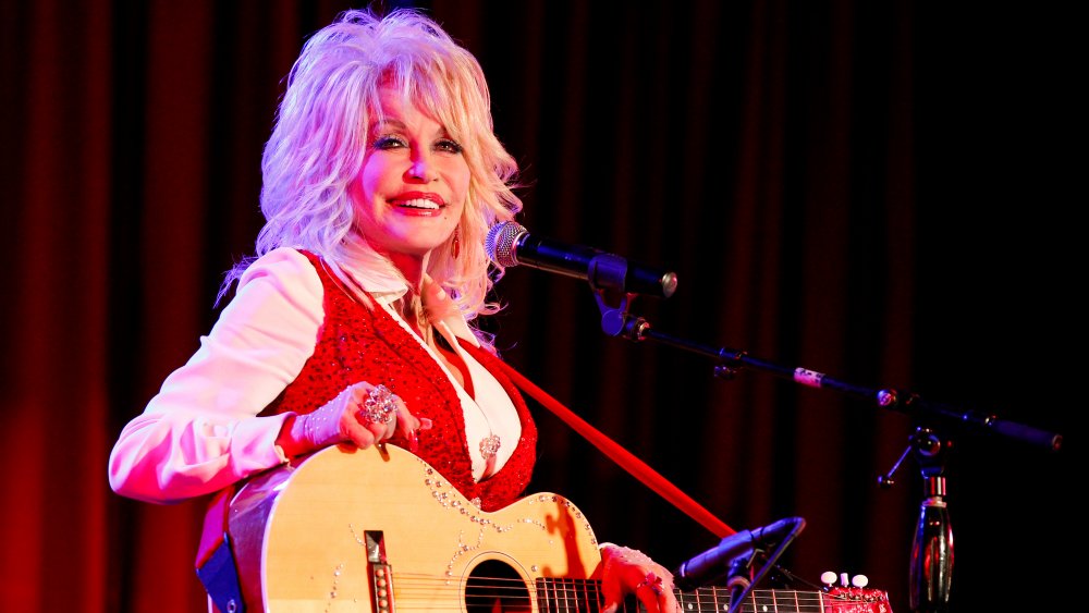 Dolly Parton en la Conferencia de Mujeres de La Tienda Roja de Stella Parton en 2014