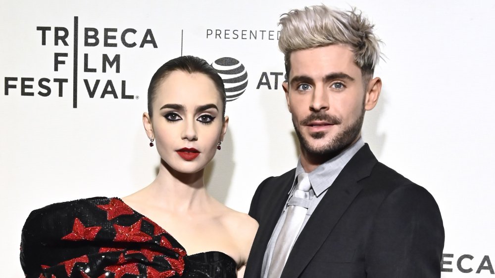 Lily Collins y Zac Efron en un estreno en la alfombra roja 