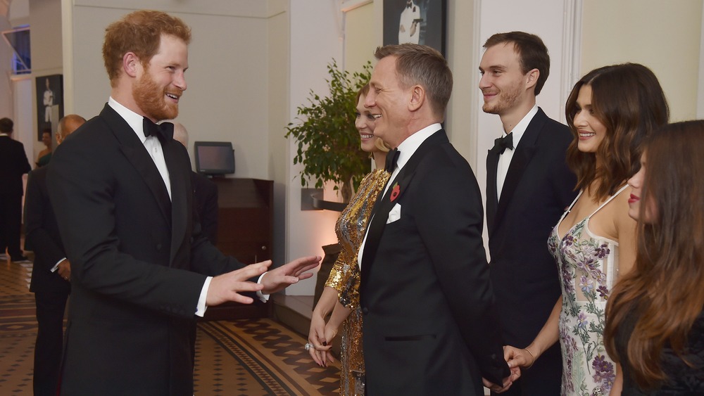 Príncipe Harry, Daniel Craig y Rachel Weisz