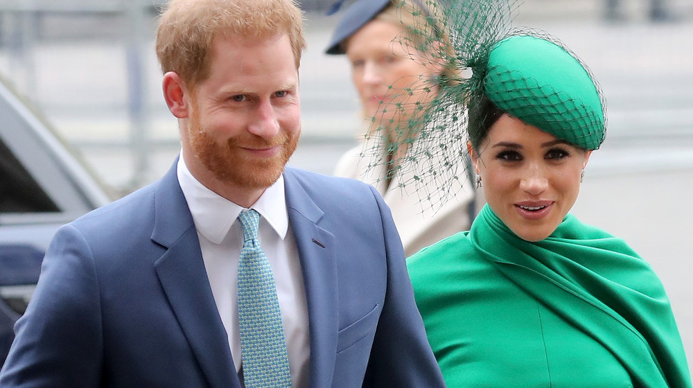 El príncipe Harry con Meghan Markle en un evento