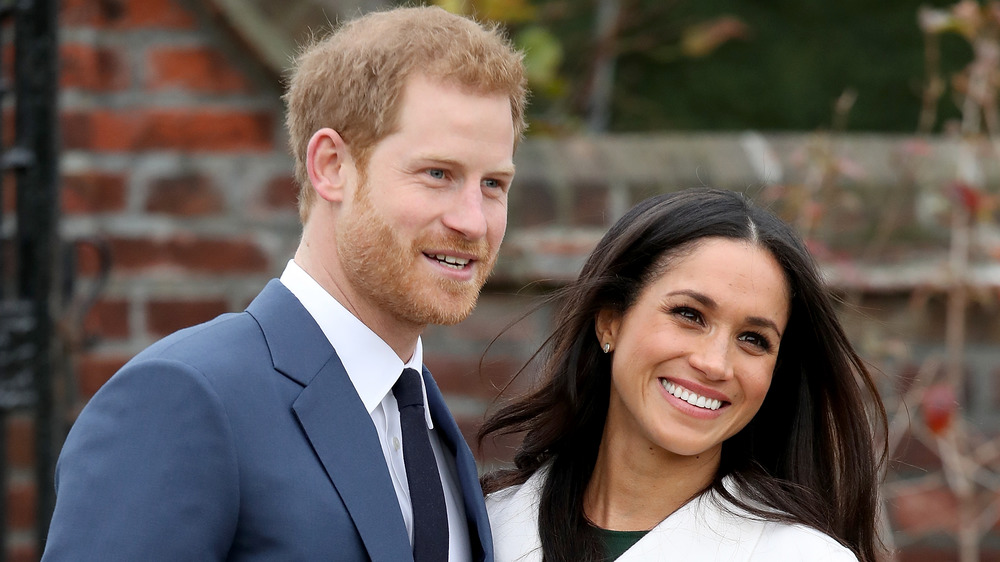 El príncipe Harry Meghan Markle posando para las cámaras