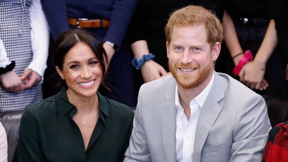 El príncipe Harry y Meghan Markle sonriendo