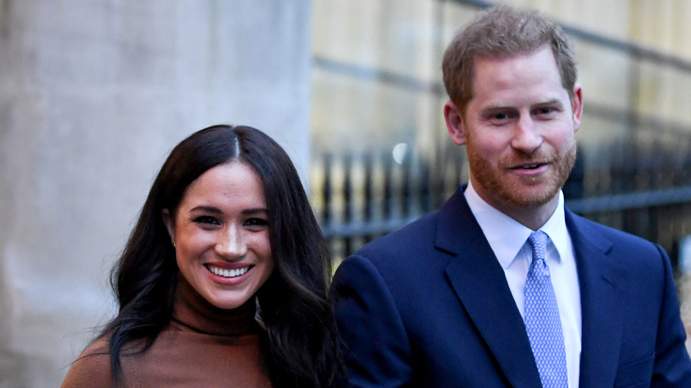 El príncipe Harry y Meghan Markle sonriendo