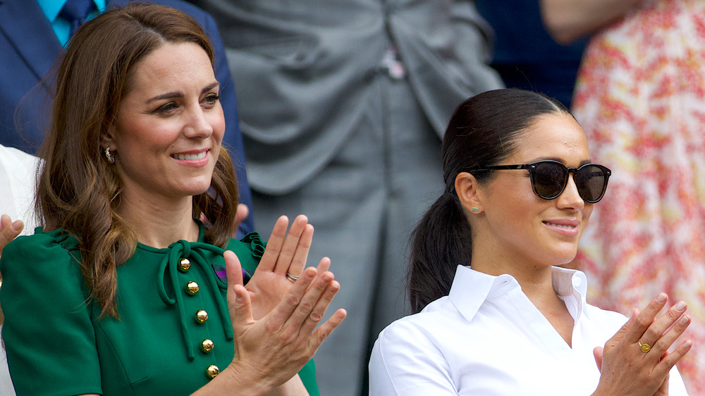 Kate Middleton, Meghan Markle y Pippa Middleton aplaudiendo