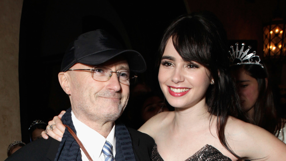 Phil Collins y Lily Collins 