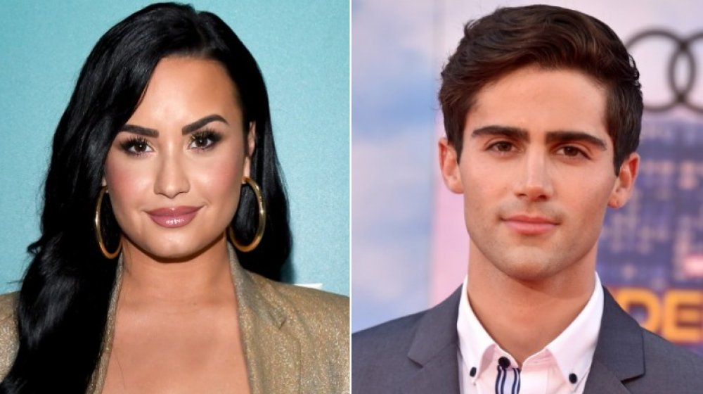 Demi Lovato y Max Ehrich sonriendo