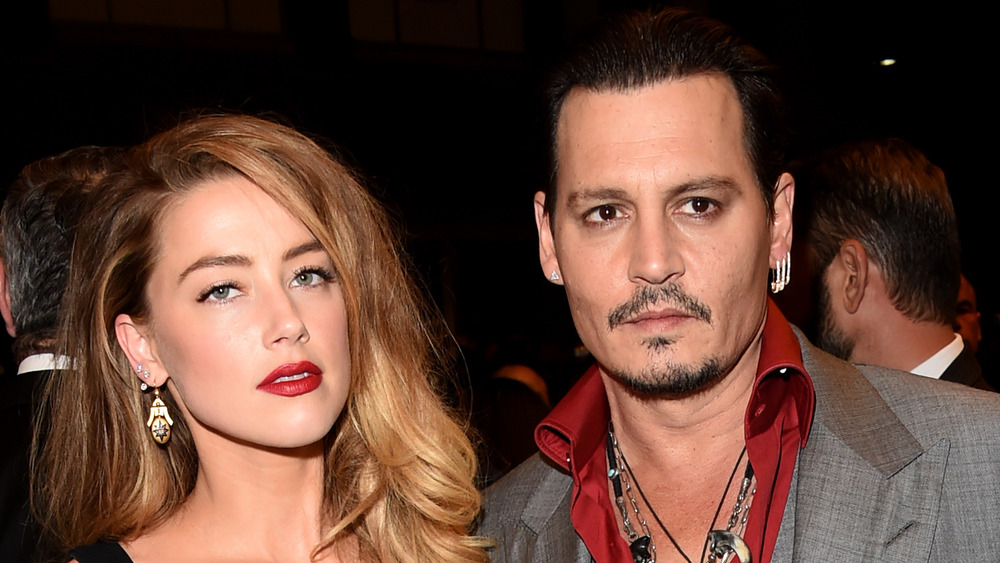 Amber Heard y Johnny Depp en un evento