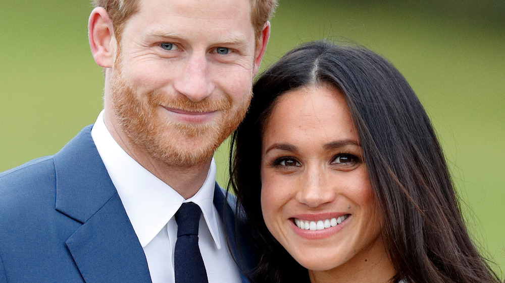 El príncipe Harry y Meghan Markle sonriendo 