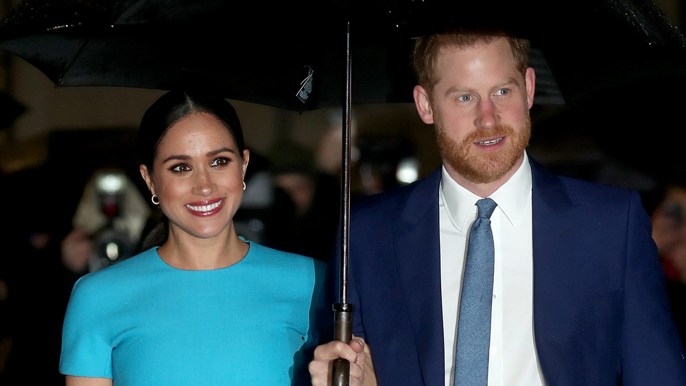 Meghan Markle y el príncipe Harry sonriendo