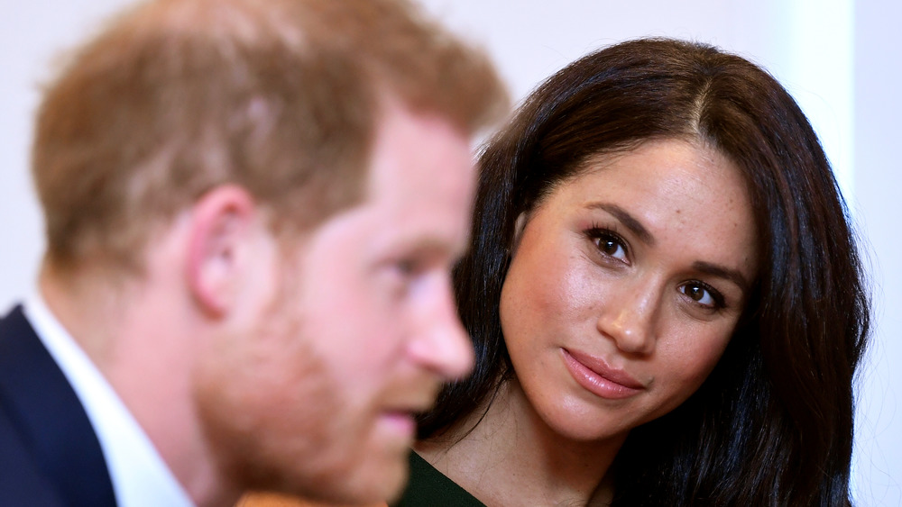 Meghan Markle y el príncipe Harry en un evento