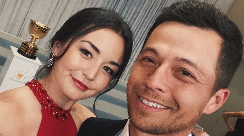 Xander Schauffele y Maya Lowe tomándose una selfie