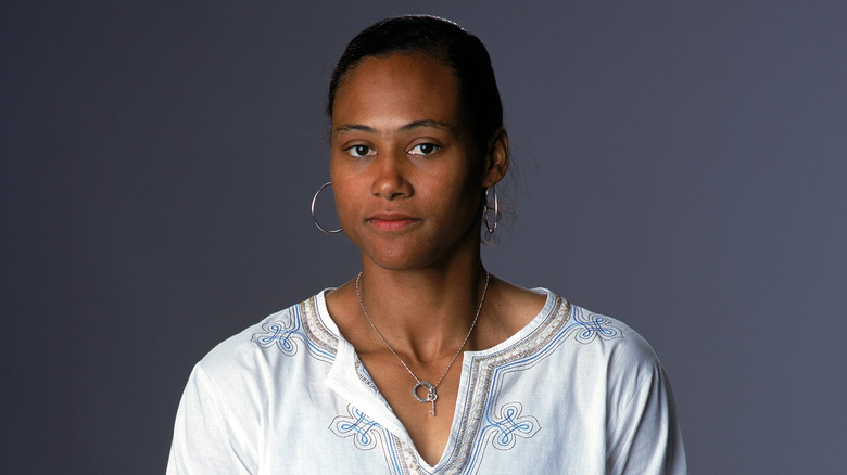 Marion Jones posando para el retrato del equipo olímpico